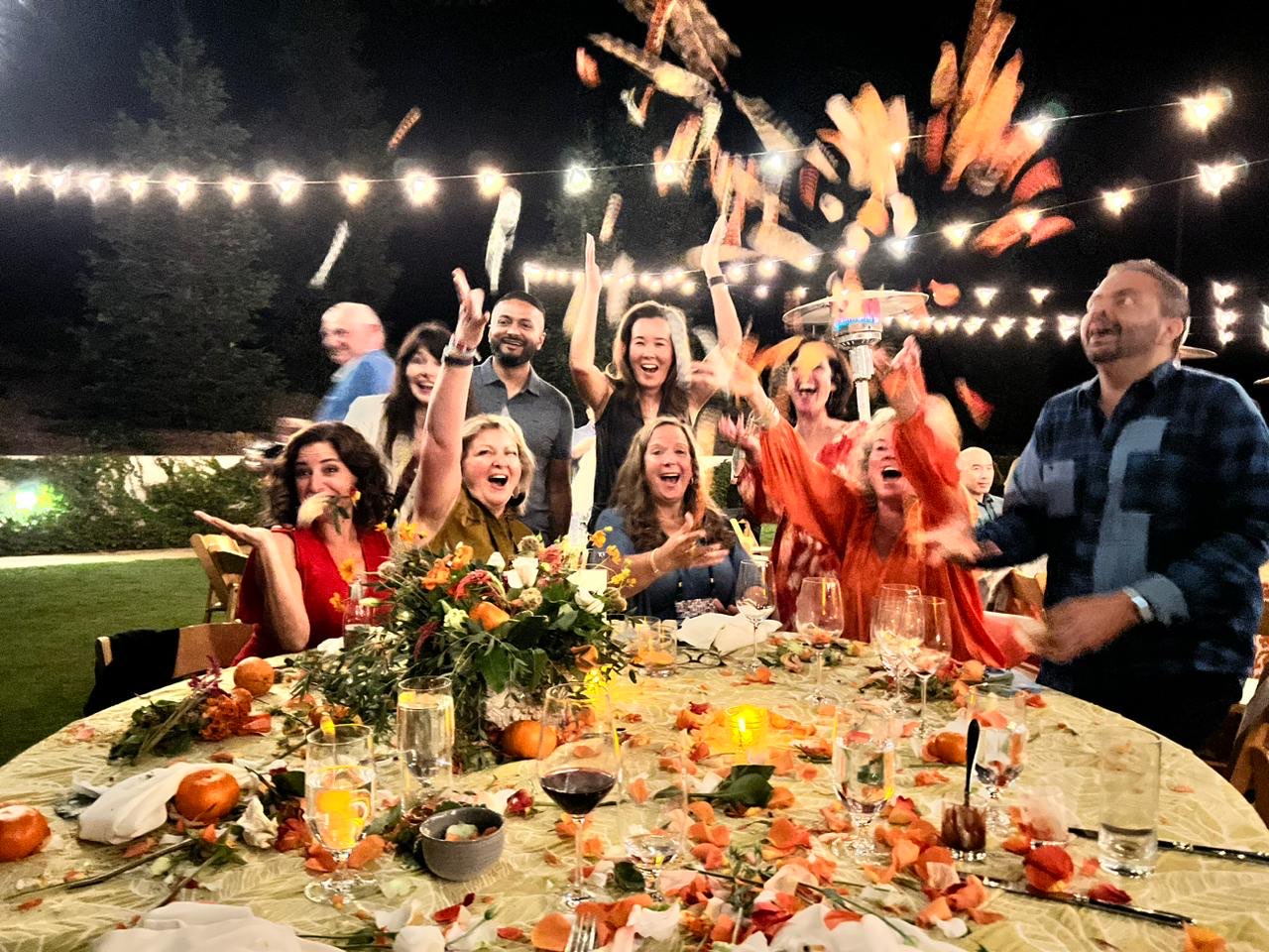 MMT dinner celebration with confetti
